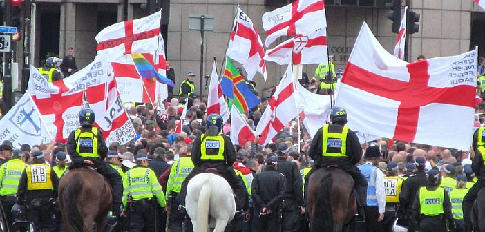 Far right protesters and police on horses