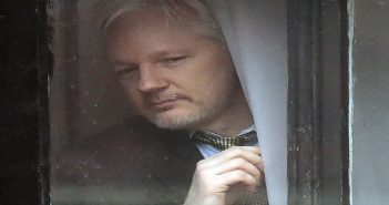 Julian Assange at Ecuodor Embassy window