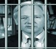Julian Assange behind bars