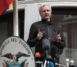 Julian Assange outside Ecuador Embassy